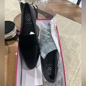 Vince Camuto leather and suede flat loafer.